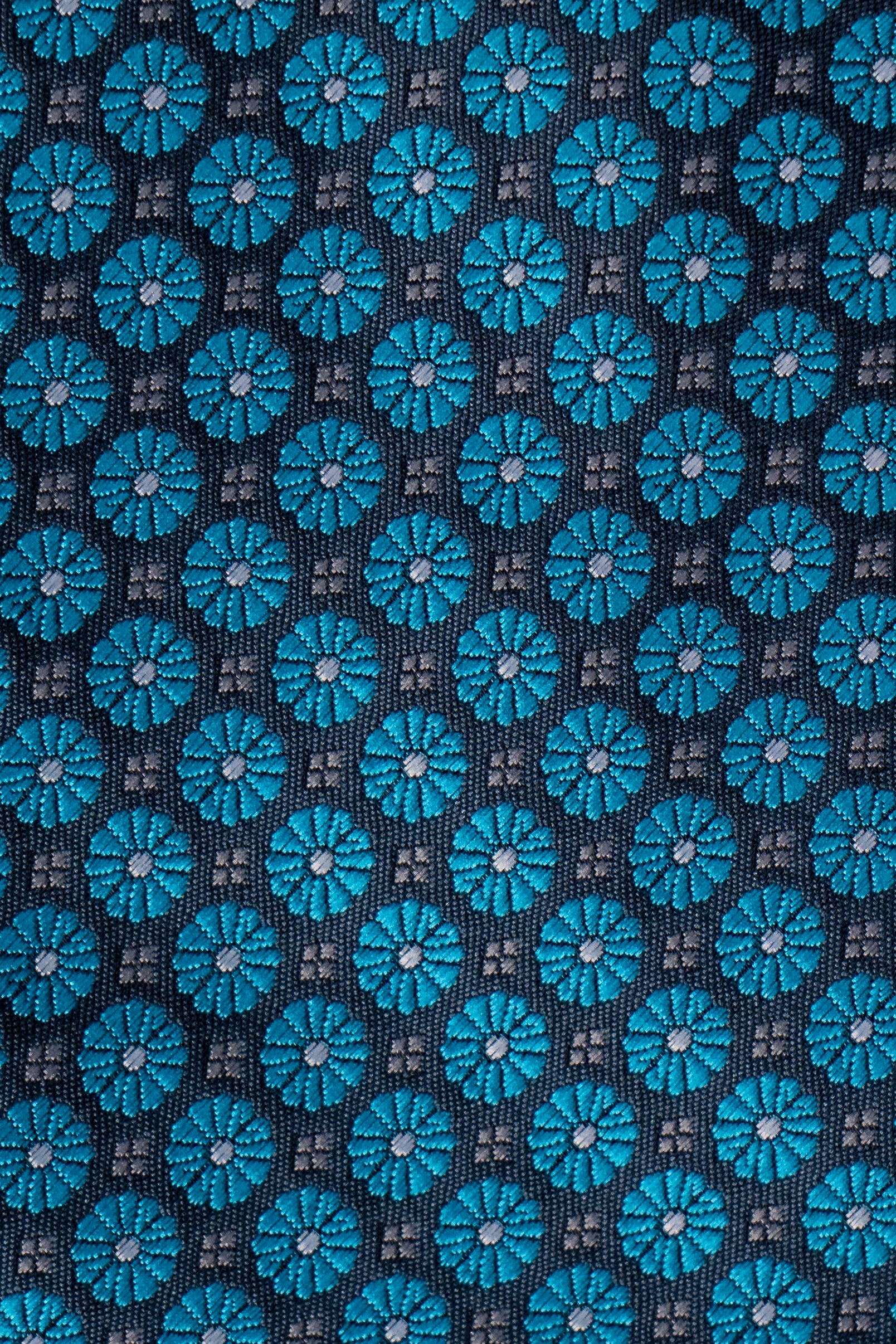 The Artisan Motif — Teal Floral on Black